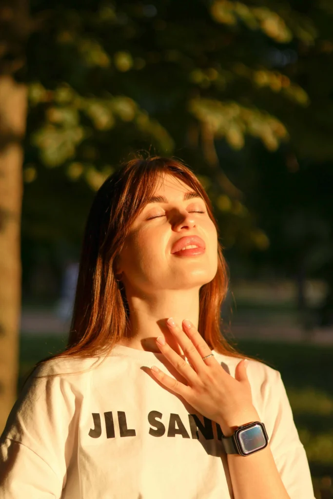 A calm woman, in complete well-being and connection with her inner self.